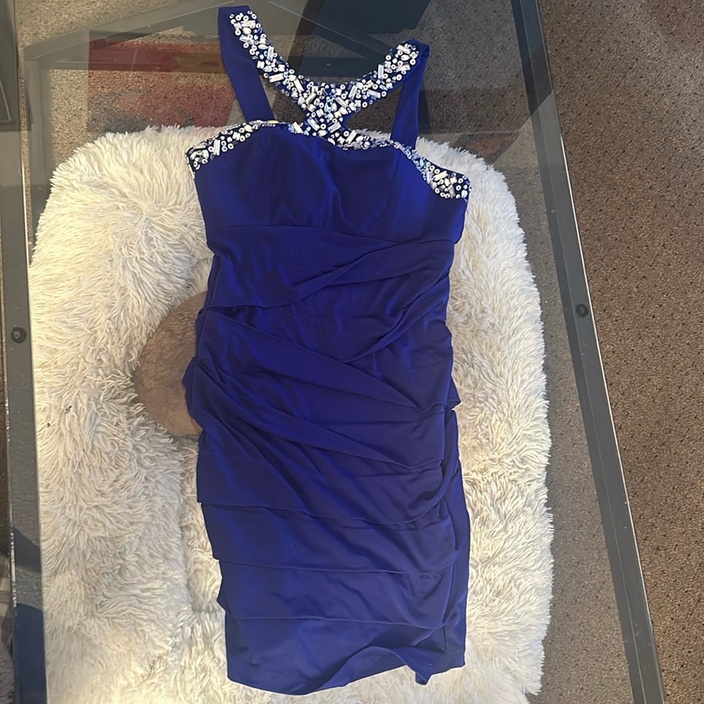 Worn once. Blue tight fitted dress.
